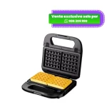 Máquina eléctrica 2 en 1 Taurus Dofles abierta con waffles amarillos en su placa inferior