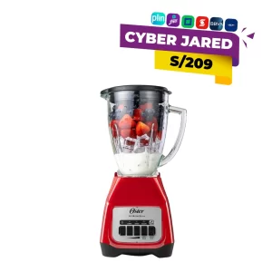 Licuadora Oster roja BLSTKAG-RPB-053 de 1.5 litros con jarra de vidrio licuando fresas y hielo