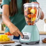 Combo Oster: Licuadora de 2 Velocidades con Vaso de Vidrio + Cuchilla Adicional - Imagen 6