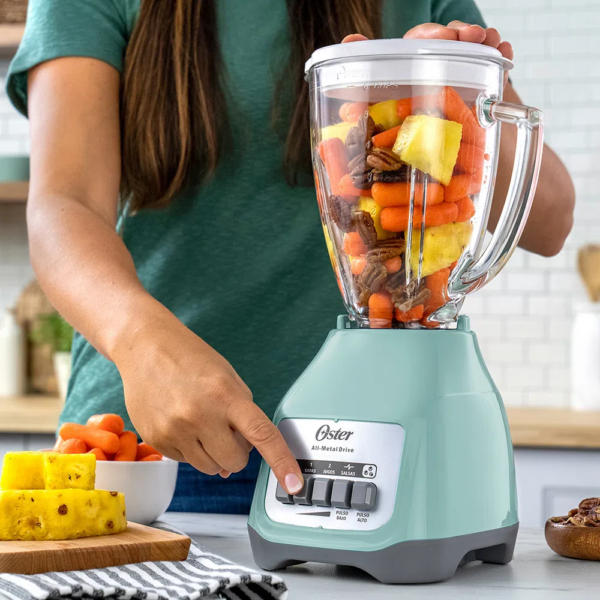 Combo Oster: Licuadora de 2 Velocidades con Vaso de Vidrio + Cuchilla Adicional - Imagen 6